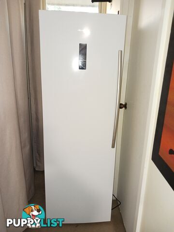 A matching pair, white fridge and freezer.