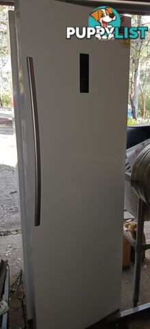 A matching pair, white fridge and freezer.