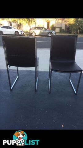 Wanted: 2 brown leather chairs with strong stainless steel legs