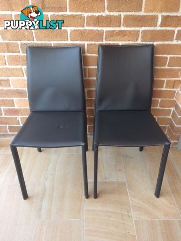 Wanted: Two black leather chairs