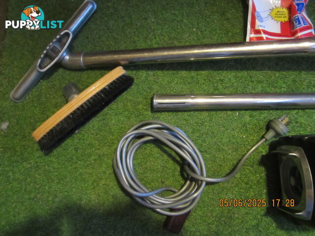 vintage Barrel-style Electrolux vacuum cleaner 1950-60. with cream coloured hose,