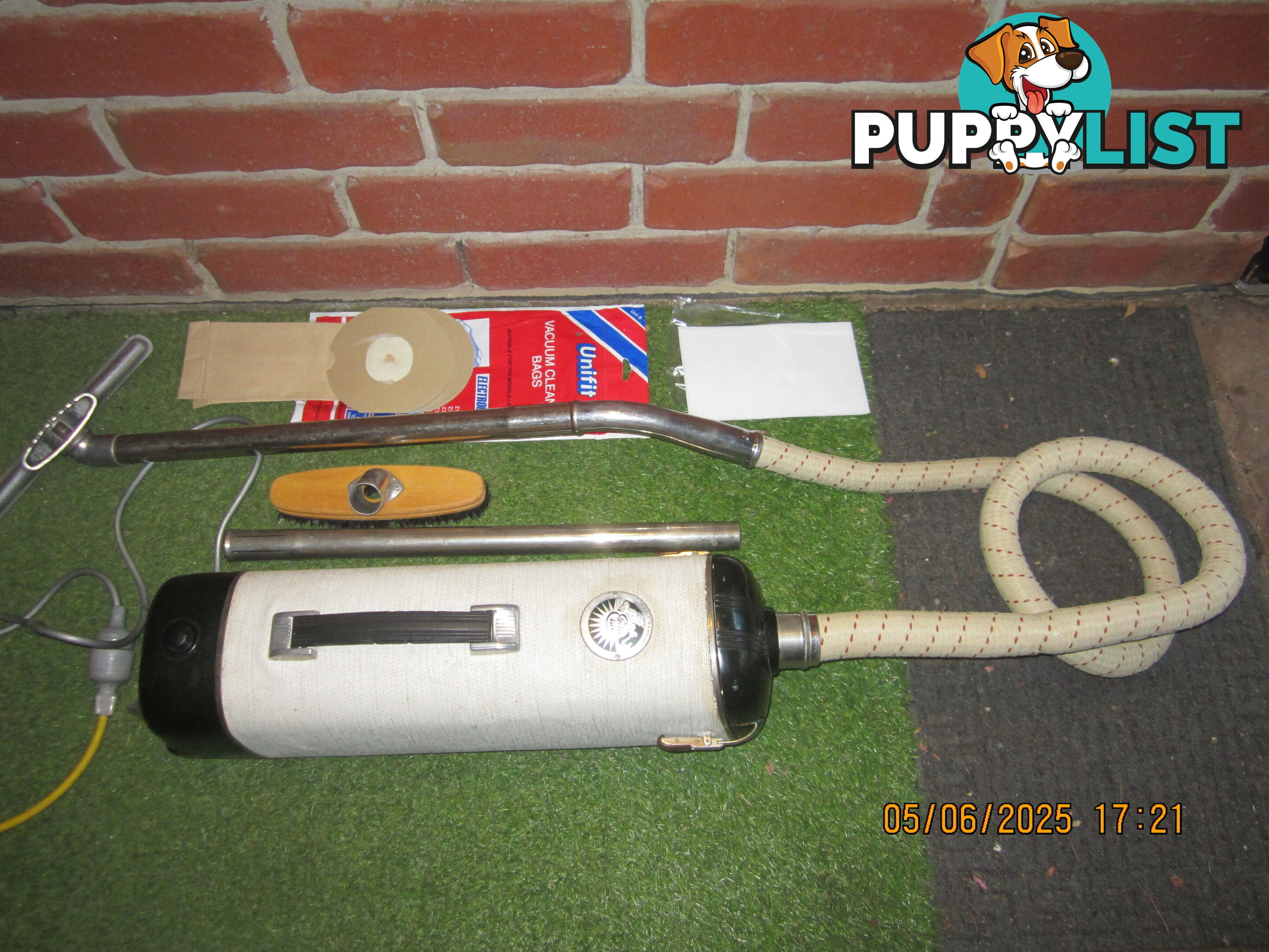 vintage Barrel-style Electrolux vacuum cleaner 1950-60. with cream coloured hose,