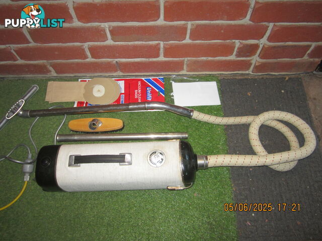 vintage Barrel-style Electrolux vacuum cleaner 1950-60. with cream coloured hose,