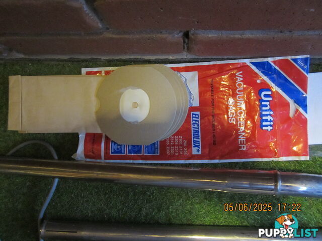vintage Barrel-style Electrolux vacuum cleaner 1950-60. with cream coloured hose,