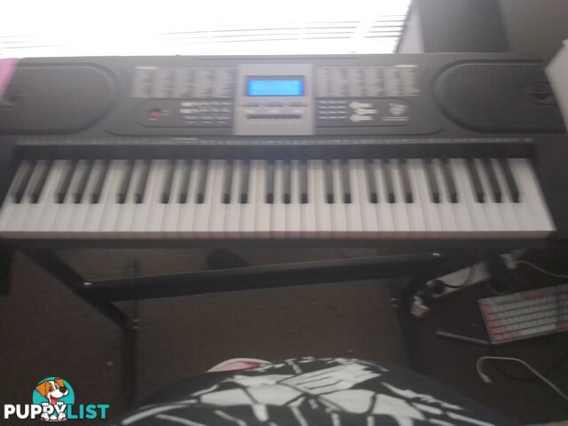 Yamaha keyboard with stand