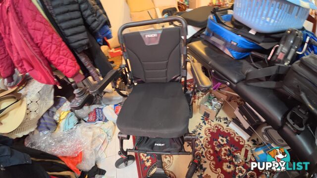PRIDE IGO FOLDING POWER WHEELCHAIR – CARBON FIBRE