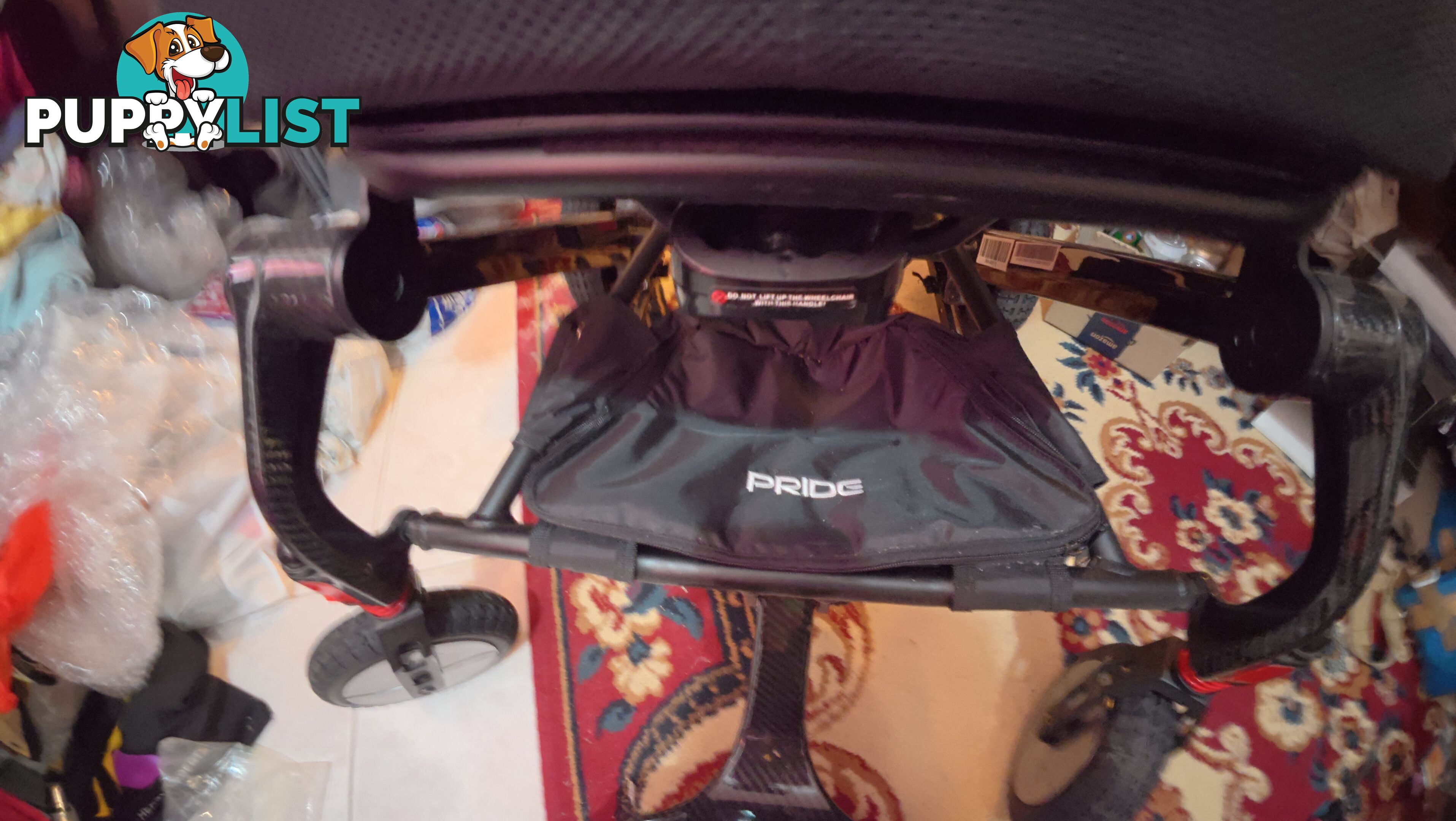 PRIDE IGO FOLDING POWER WHEELCHAIR – CARBON FIBRE