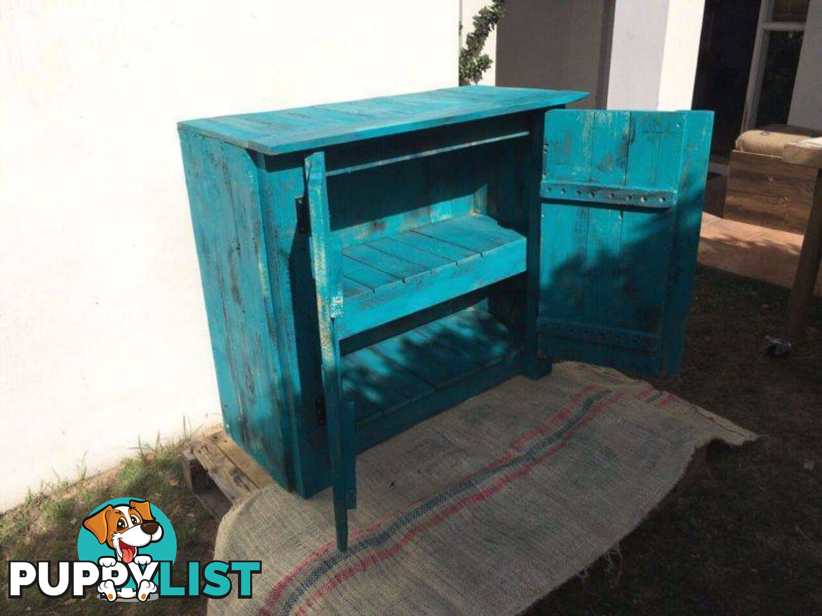 Teal coloured cupboard $400