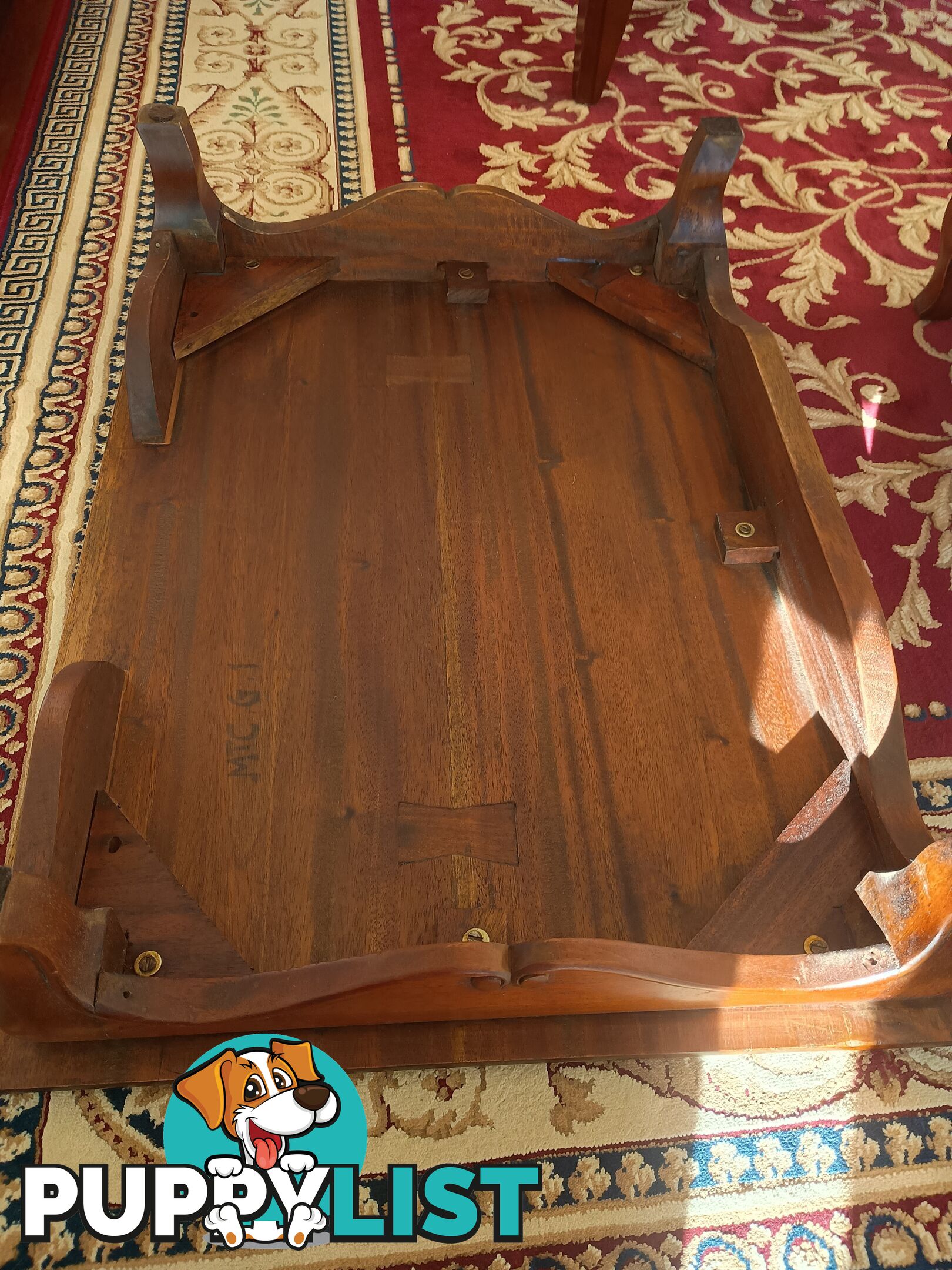Solid rosewood table pedestals and/ or breakfast trays.