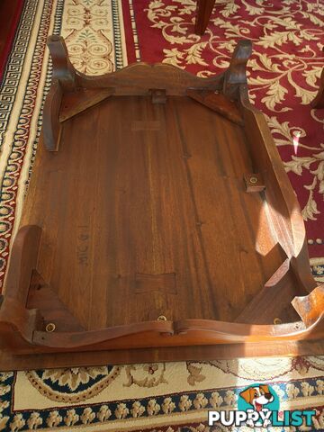Solid rosewood table pedestals and/ or breakfast trays.