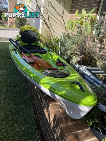 Kayak Hurricane Skimmer 206 with light weight split paddle and gas filled vest.