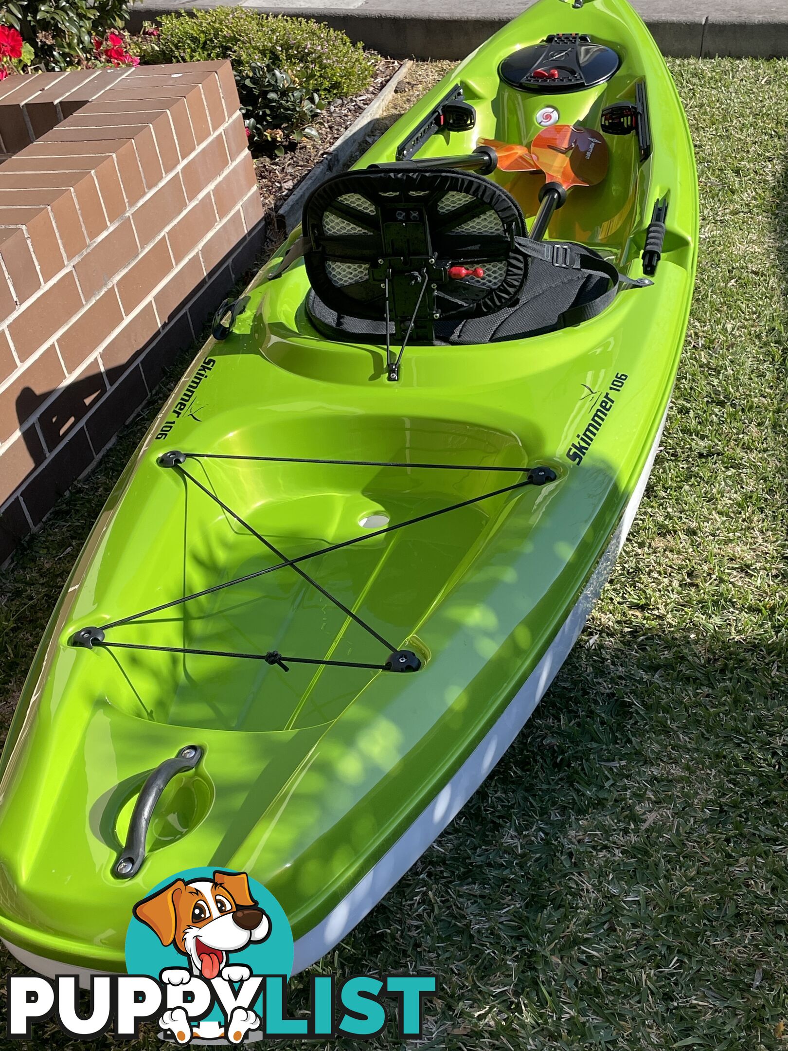 Kayak Hurricane Skimmer 206 with light weight split paddle and gas filled vest.