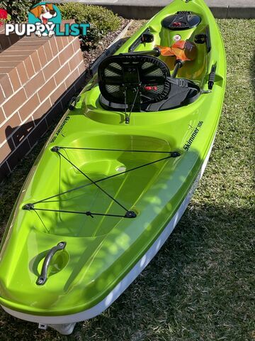 Kayak Hurricane Skimmer 206 with light weight split paddle and gas filled vest.