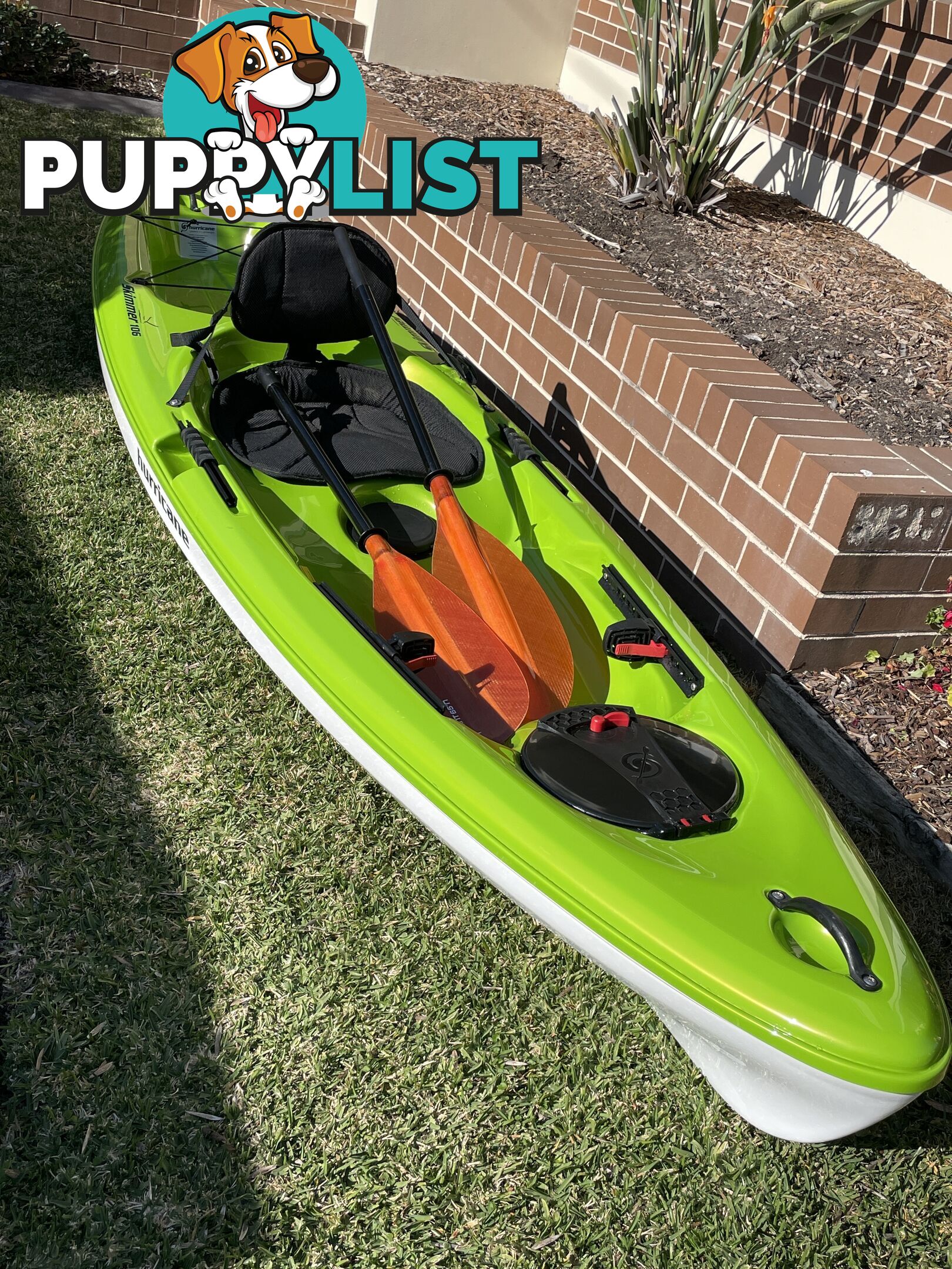 Kayak Hurricane Skimmer 206 with light weight split paddle and gas filled vest.