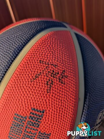 Adelaide 36ers basketball with player signatures