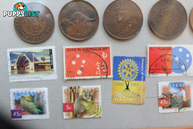 Penny&amp;#39;s and old stamps in picture frame