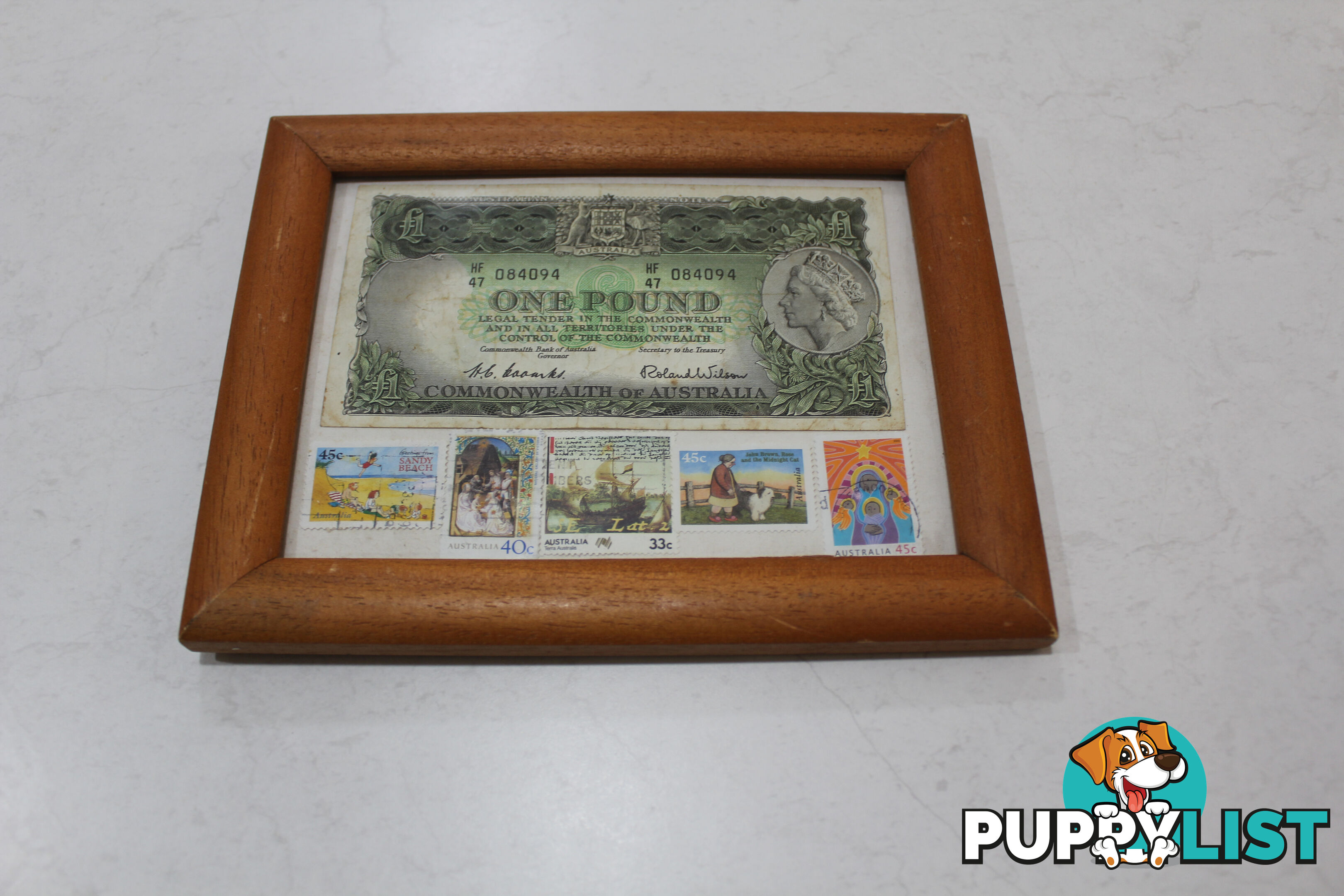 Australian Pound note and old stamps