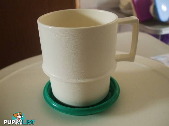 Four Tupperware Cups with Coasters/Lids