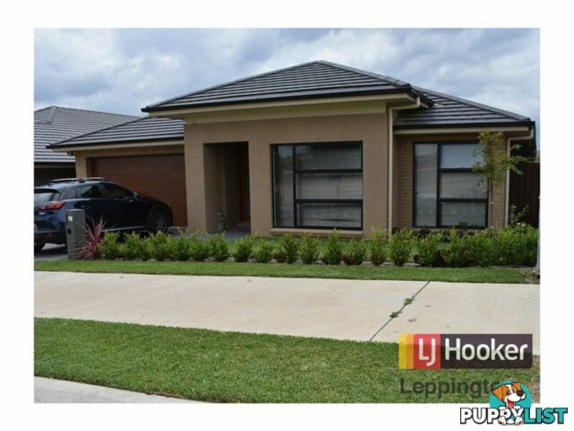 16 Larkham Street ORAN PARK NSW 2570