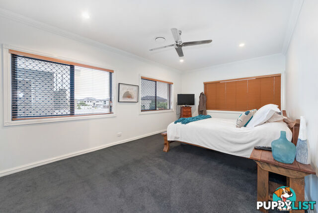 112 Sir Bruce Small Blvd BENOWA WATERS QLD 4217