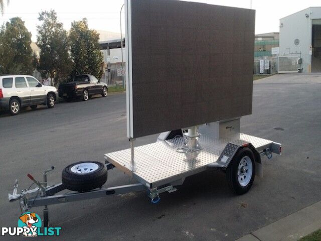 CUSTOM SIGN AND ADVERTISING TRAILERS