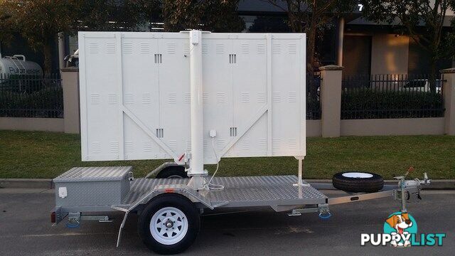 CUSTOM SIGN AND ADVERTISING TRAILERS