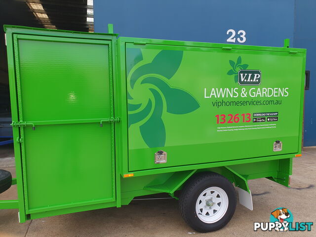 CUSTOM MOWER TRAILERS