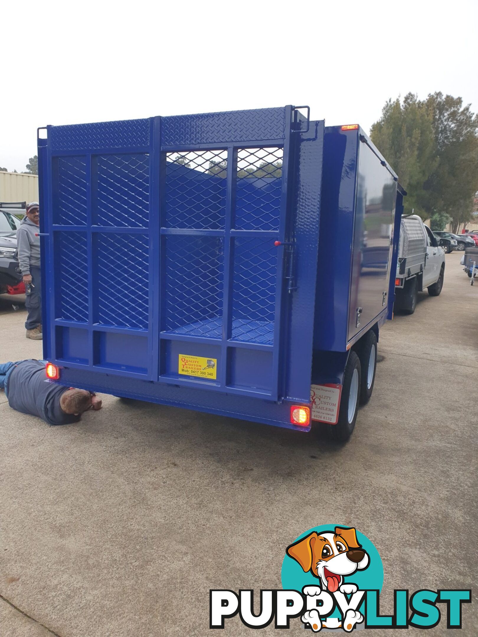 CUSTOM MOWER TRAILERS