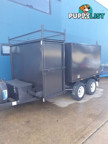 CUSTOM MOWER TRAILERS