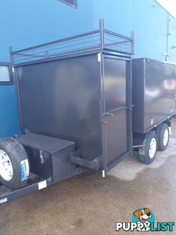 CUSTOM MOWER TRAILERS