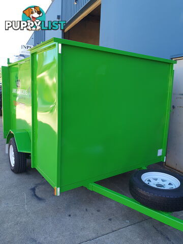 CUSTOM MOWER TRAILERS