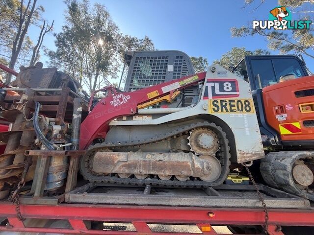 2022 5.5T Hitachi exc, attachments, 75HP TL8 positrak on a Nissan UD flatbed with hydraulic ramps