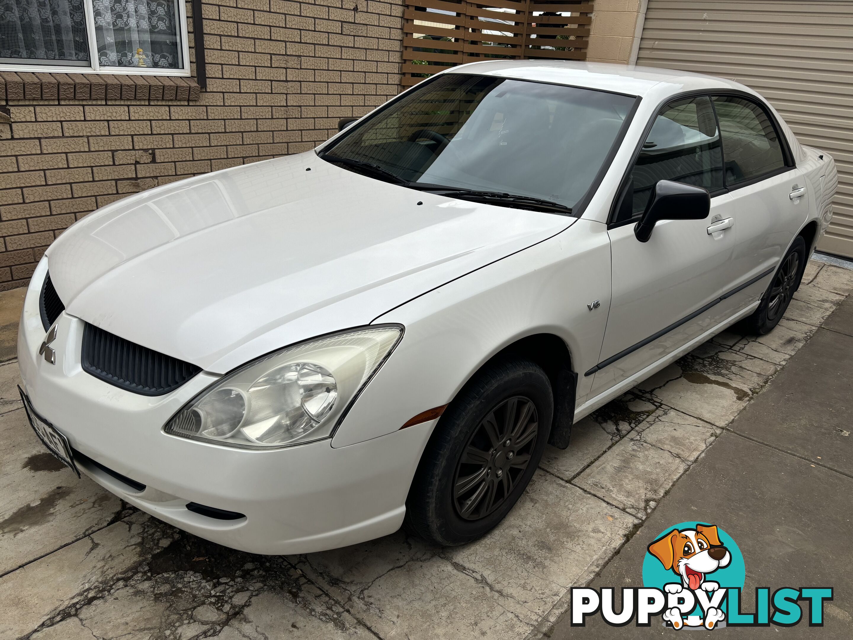 2005 MITSUBISHI MAGNA ES 4 SP AUTO SPORTS MODE 4D SEDAN