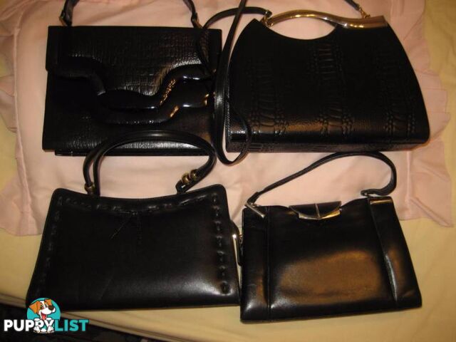 4 Leather Black Woman's Hand bags