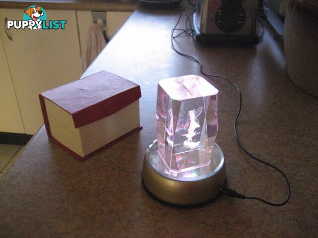 Fairy Rotating Crystal in a Rainbow Colour Light