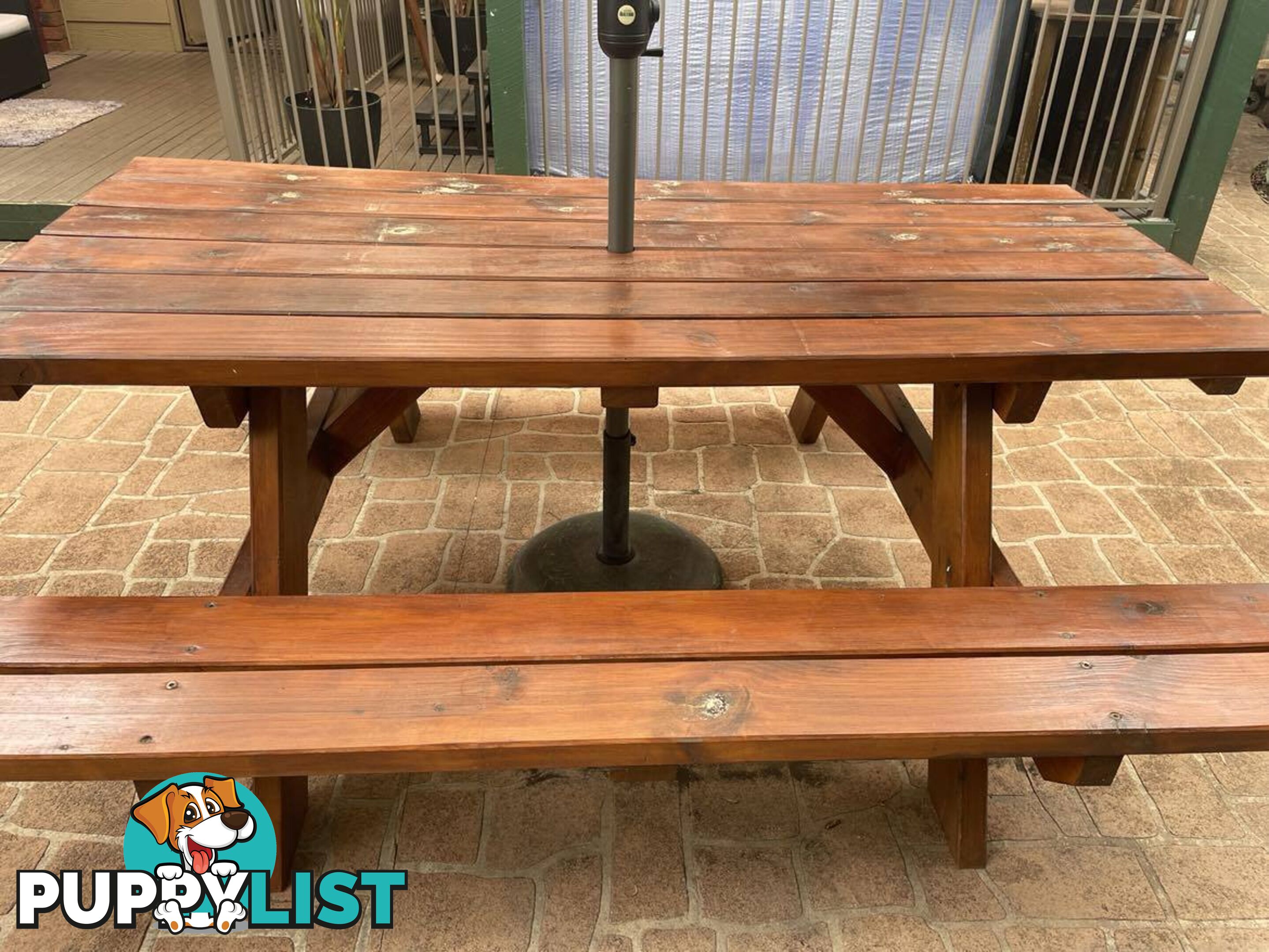 Timber picnic table and Coolaroo Aluminium Market Umbrella with concrete base.