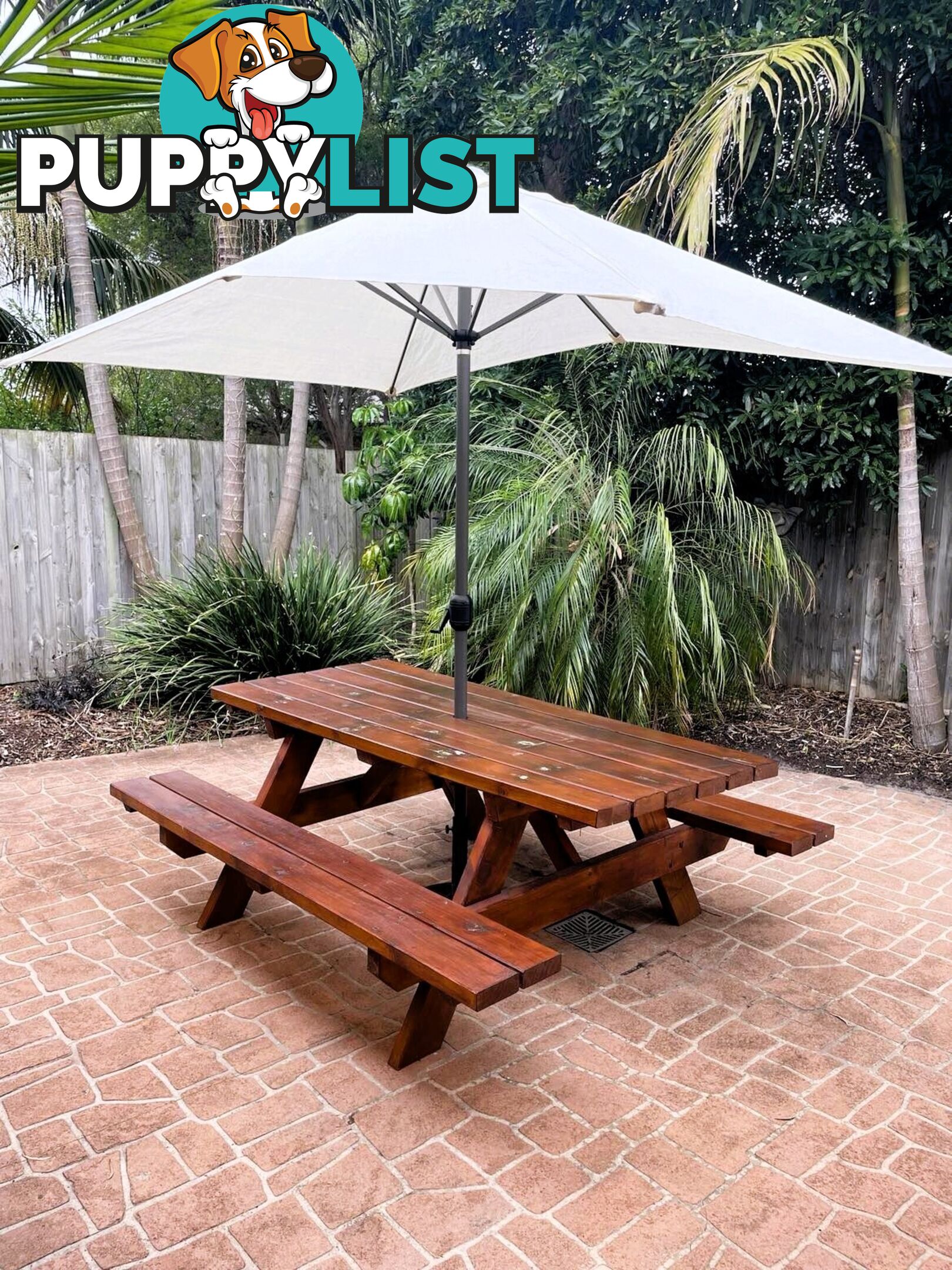 Timber picnic table and Coolaroo Aluminium Market Umbrella with concrete base.