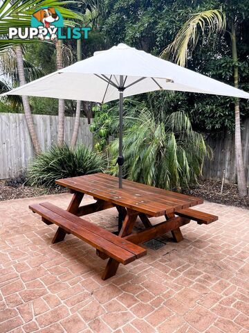 Timber picnic table and Coolaroo Aluminium Market Umbrella with concrete base.