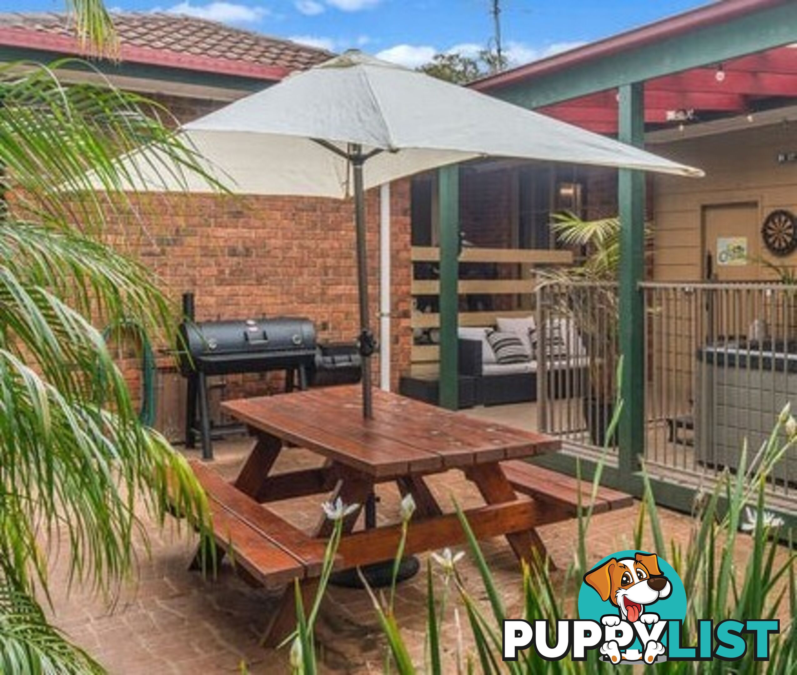 Timber picnic table and Coolaroo Aluminium Market Umbrella with concrete base.