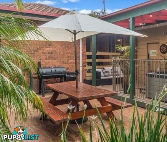 Timber picnic table and Coolaroo Aluminium Market Umbrella with concrete base.