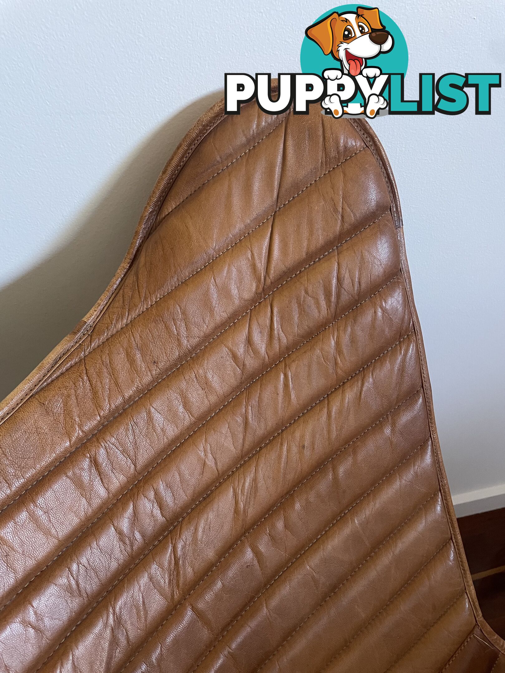 Beautiful tan leather butterfly chair