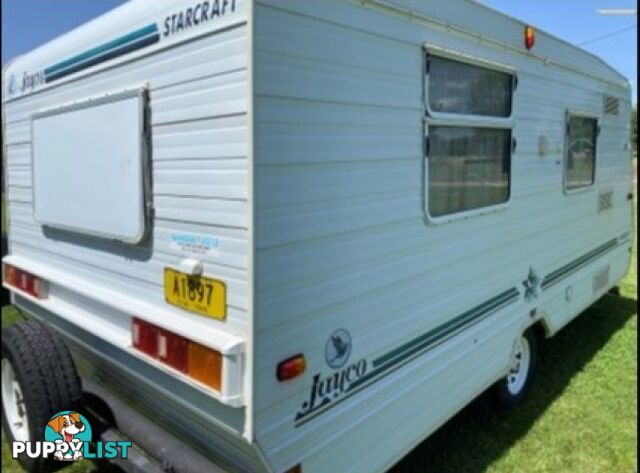 #2069 JAYCO STARCRAFT 17' SINGLE AXEL NEW ROLL OUT. HAS S/H WALLS. A RARE FULL FAN. FRONT KITCHEN. ISLAND BED. ALL ELECTRIC FRIDGE. PORTA POTTY. FRONT KITCHEN ISLAND BED TABLE COULD MAKE BED? THIS VAN IS A BARGAIN ALUMINIUM FRAME STRONGER & LIGHTER