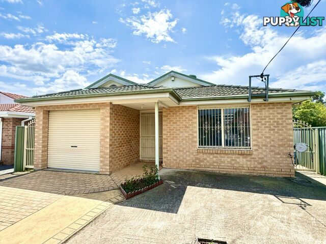 51 WATTLE AVENUE CARRAMAR NSW 2163