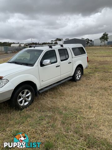 2012 Nissan Navara 550 DUAL CAB D40 S5 MY12 UTILITY 4X4 Ute Automatic