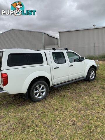 2012 Nissan Navara 550 DUAL CAB D40 S5 MY12 UTILITY 4X4 Ute Automatic