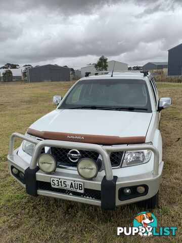 2012 Nissan Navara 550 DUAL CAB D40 S5 MY12 UTILITY 4X4 Ute Automatic