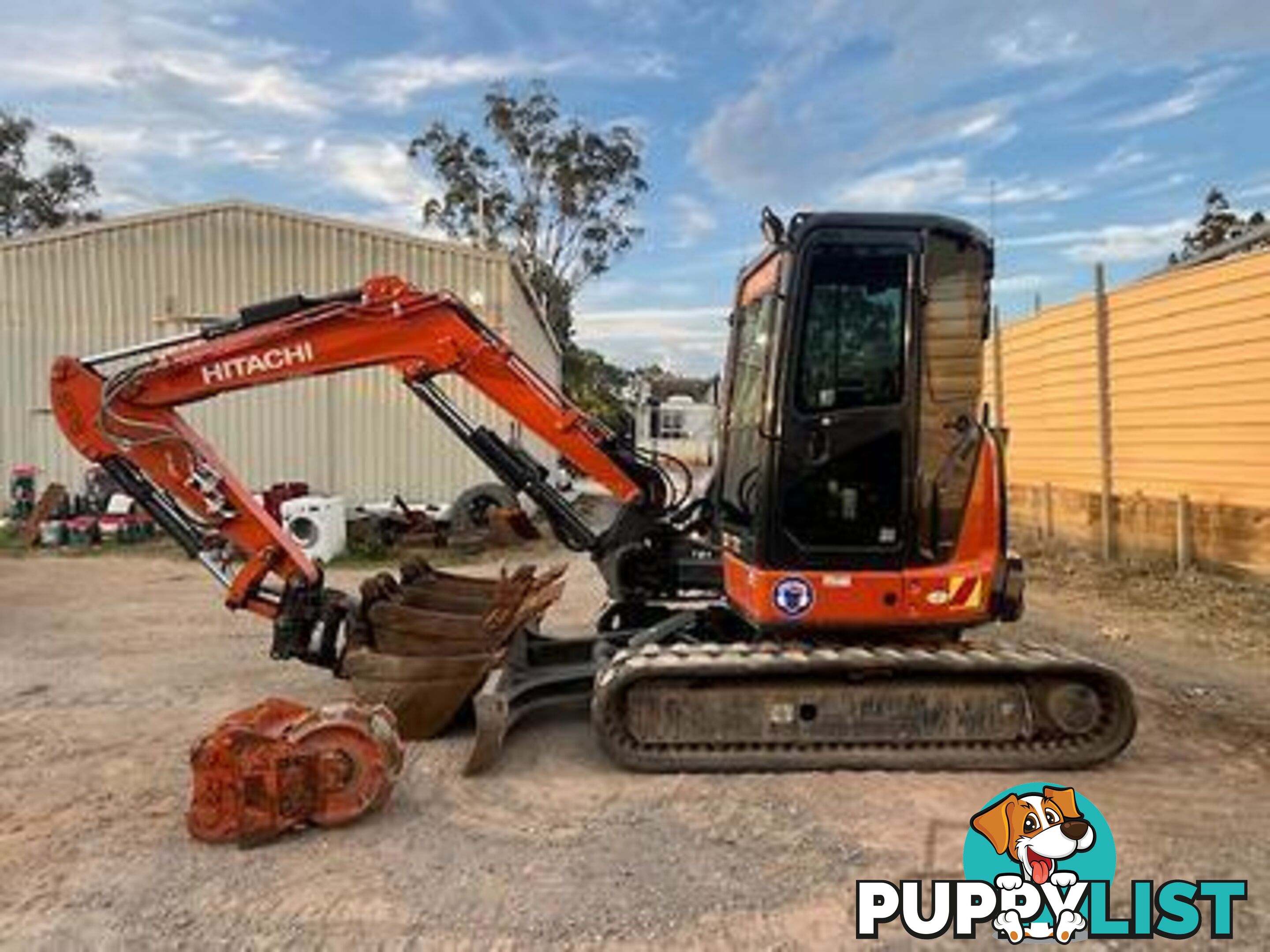 2022 5.5T Hitachi exc, attachments, 75HP TL8 positrak on a Nissan UD flatbed with hydraulic ramps