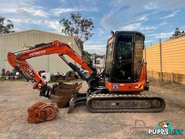 2022 5.5T Hitachi exc, attachments, 75HP TL8 positrak on a Nissan UD flatbed with hydraulic ramps