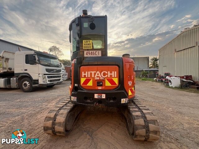 2022 5.5T Hitachi exc, attachments, 75HP TL8 positrak on a Nissan UD flatbed with hydraulic ramps