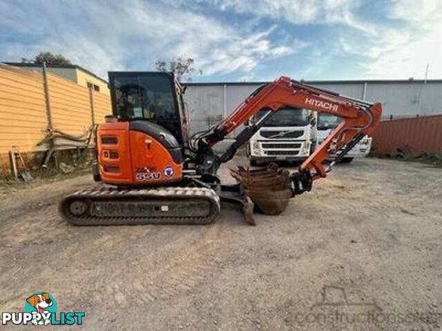 2022 5.5T Hitachi exc, attachments, 75HP TL8 positrak on a Nissan UD flatbed with hydraulic ramps